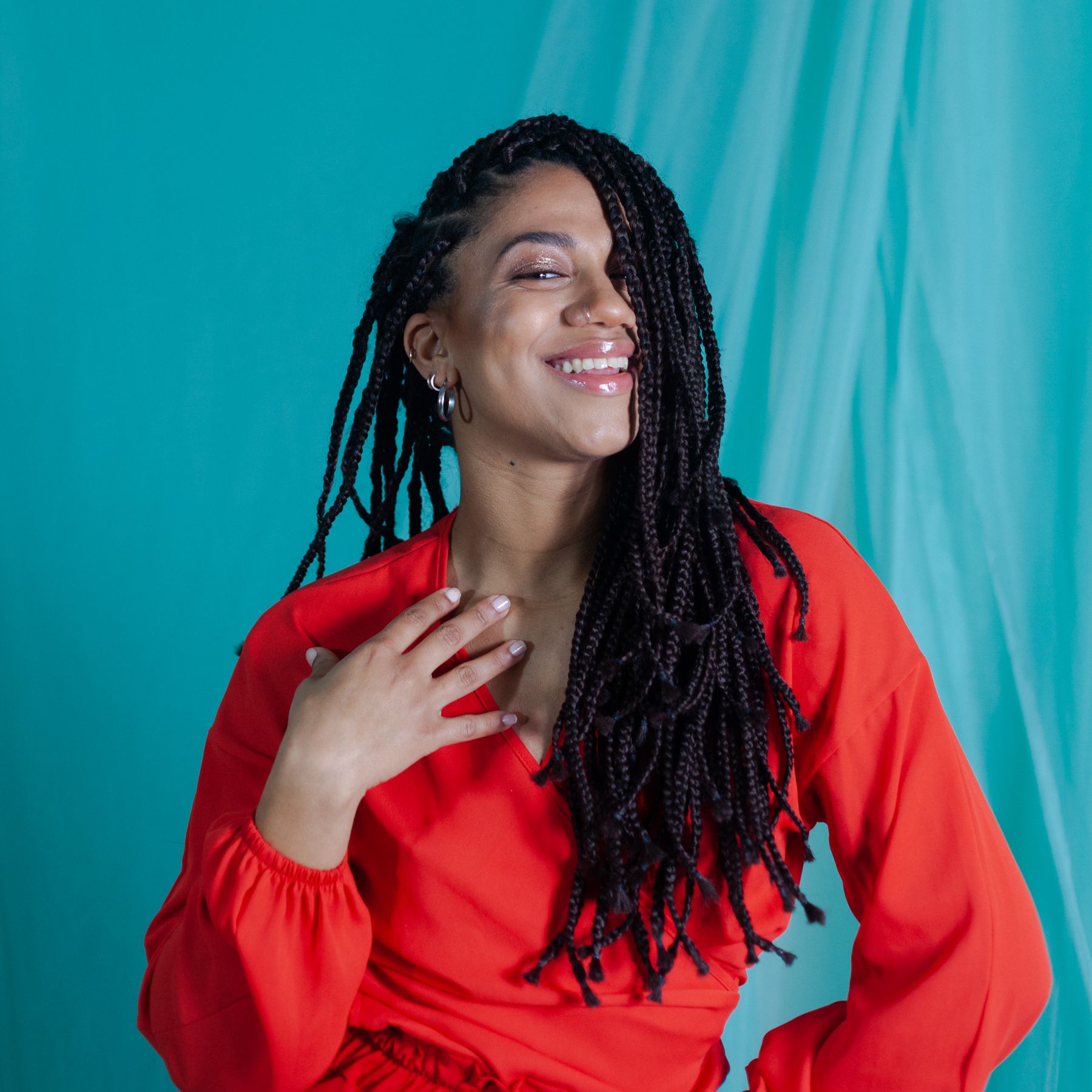 Smiling woman with long braids